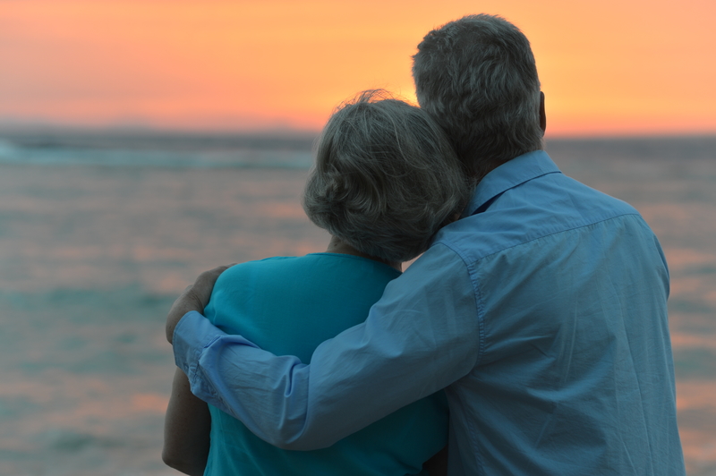 Older Couple Watching Ocean