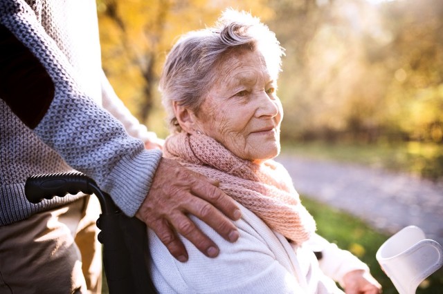 Hand on Shoulder of Older Lady